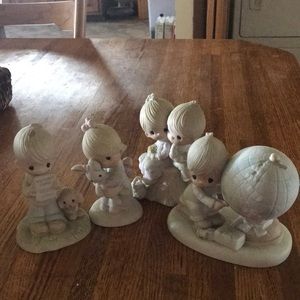 Four adorable Precious Moment Statues